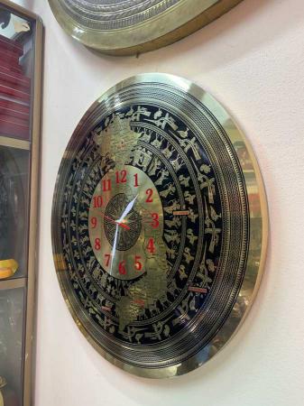 Đồng hồ mặt trống đồng mẫu kim trôi độc quyền dodongquangvuong